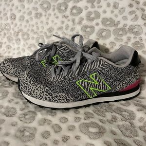 Women’s leopard print New Balance shoes